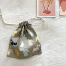 Travel Storage Cotton Bag Drawstring Multi-Purpose. Gray background bunny-cotton material