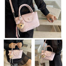 Pink Compact PU Leather Crossbody Bag With a pendant- Lightweight Handheld Shoulder Purse with Adjustable Strap, Zipper Closure and Metal Feet for Women, Daily Commute and Travel
