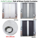 Pair of Solid Colour Sheer Eyelet Curtains 137 x 213 cm White - NuSea