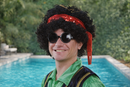 Retro Hippie Party Wig – Black Curly Afro with Red Sequin Headband